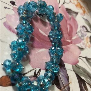 Vibrant Blue Bracelet with Translucent Beads and Textured Design